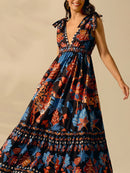 the MIDNIGHT JUNGLE - Fashionable and Elegant Women's Sleeveless Deep V-Neck Casual Vacation Beach Dress Featuring a Bohemian Style with Tropical Leopard, Pineapple and Toucan Prints, Perfect for Summer.