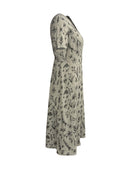 the OLIVE BRANCH BOHO - Boho Chic Floral Print Maxi Dress for Women - Elegant V-Neck, Short Sleeve, Cinched Waist A-Line Dress with Ruffled Hem, Lightweight Polyester Blend, Perfect for Spring & Summer Outings, Vacations, and Casual Wear, Vacation Boho