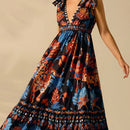 the MIDNIGHT JUNGLE - Fashionable and Elegant Women's Sleeveless Deep V-Neck Casual Vacation Beach Dress Featuring a Bohemian Style with Tropical Leopard, Pineapple and Toucan Prints, Perfect for Summer.