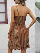 the BRONZED BOHO - Chic Boho Chic Cross-Front Allover Print Cami Dress - Sleeveless, V-Neck, Polyester, Machine Washable - Perfect for Summer Vacations