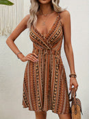 the BRONZED BOHO - Chic Boho Chic Cross-Front Allover Print Cami Dress - Sleeveless, V-Neck, Polyester, Machine Washable - Perfect for Summer Vacations