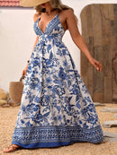 the BLUE PORCELIAN BOHO - Women's Floral Print Maxi Dress | Deep V-Neck with Crisscross Straps | Polyester, Non-Stretch Woven Fabric | Elegant Blue and White Flowy Design for Spring/Summer | Machine Washable | Perfect for Vacation & Casual Outings