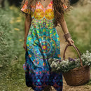 the RAINBOW GEOMETRIC BOHO - Women's Vibrant Floral Print V-Neck Maxi Dress - Short Sleeve, Loose Fit, Perfect for Spring/Summer Vacations, Lightweight Polyester Blend, Casual Style