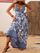 the BLUE PORCELIAN BOHO - Women's Floral Print Maxi Dress | Deep V-Neck with Crisscross Straps | Polyester, Non-Stretch Woven Fabric | Elegant Blue and White Flowy Design for Spring/Summer | Machine Washable | Perfect for Vacation & Casual Outings