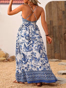the BLUE PORCELIAN BOHO - Women's Floral Print Maxi Dress | Deep V-Neck with Crisscross Straps | Polyester, Non-Stretch Woven Fabric | Elegant Blue and White Flowy Design for Spring/Summer | Machine Washable | Perfect for Vacation & Casual Outings