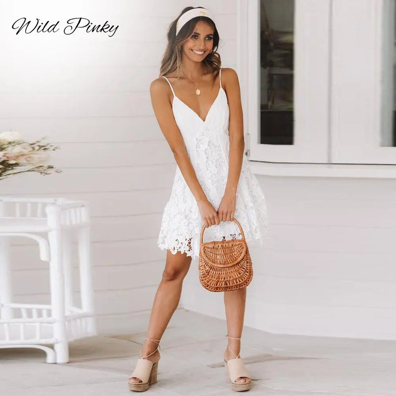 WildPinky Sexy White Dress Women Spaghetti Strap Lace Mini Dress Deep V Backless Lace Up Clubwear Party Beach Dresses Vestidos