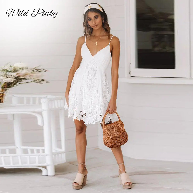 WildPinky Sexy White Dress Women Spaghetti Strap Lace Mini Dress Deep V Backless Lace Up Clubwear Party Beach Dresses Vestidos