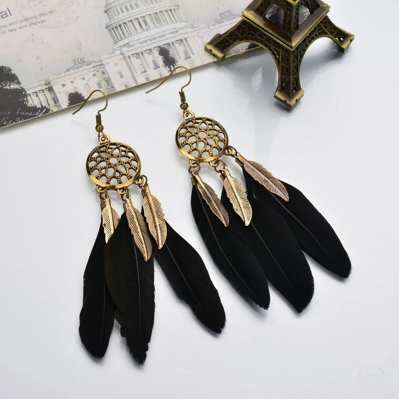 the BOHO DREAM - Hollow Vintage Leaf Feather Drop Earrings, Bohemian Feathers Long Design Hollow Metal Earrings, Ladies Jewelry