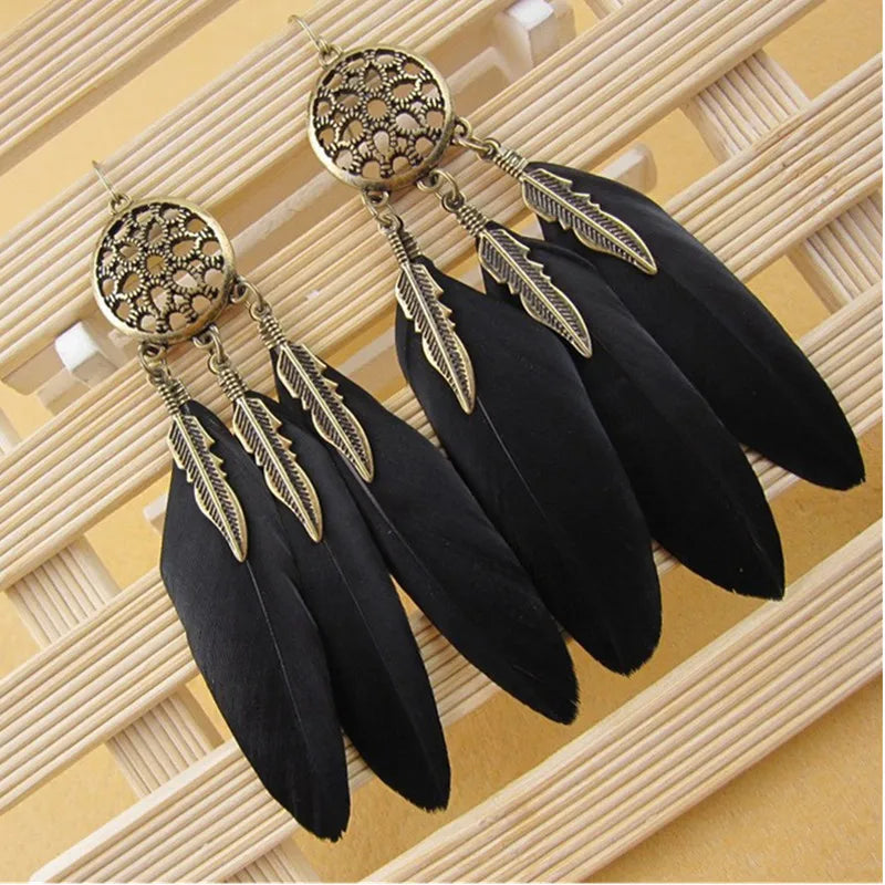 the BOHO DREAM - Hollow Vintage Leaf Feather Drop Earrings, Bohemian Feathers Long Design Hollow Metal Earrings, Ladies Jewelry