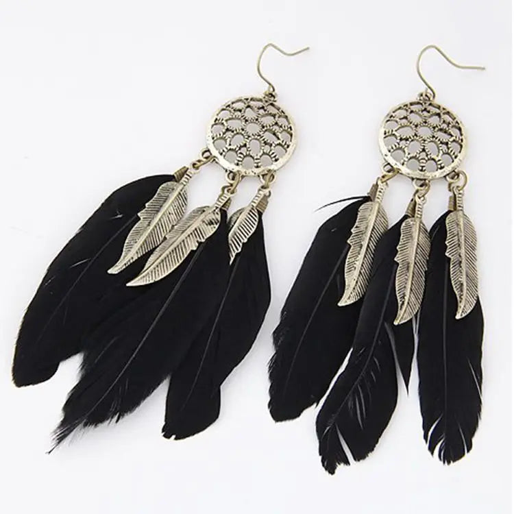 the BOHO DREAM - Hollow Vintage Leaf Feather Drop Earrings, Bohemian Feathers Long Design Hollow Metal Earrings, Ladies Jewelry