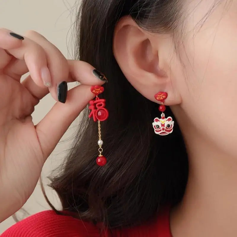 the GOOD FORTUNE - Chinese Style Red Little Lion Bell Pendant Earrings for Women, The Year of The Dragon Festive Jewelry Gifts