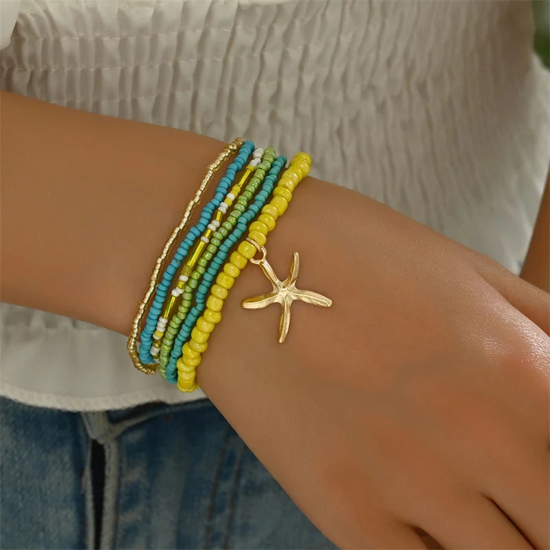 the BEADED STARFISH - Boho Stacking Multilayer Color Rice Beads Starfish Bracelet for Women, Fashion Beaded Rope Chain Summer Beach Wrist Jewelry Gifts