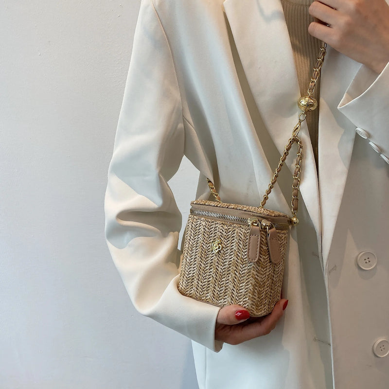 the PICNIC BOHO - Mini Straw Bucket Crossbody Bag for Women, Summer Weave Women's Brand Handbags and Purses, Fashion Chain Simple Shoulder Bags