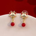 the GOOD FORTUNE - Chinese Style Red Little Lion Bell Pendant Earrings for Women, The Year of The Dragon Festive Jewelry Gifts