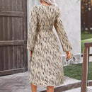 the BREEZY BOHO - Fashion Casual V-Neck Printed Irregular Hem Long Sleeved Top