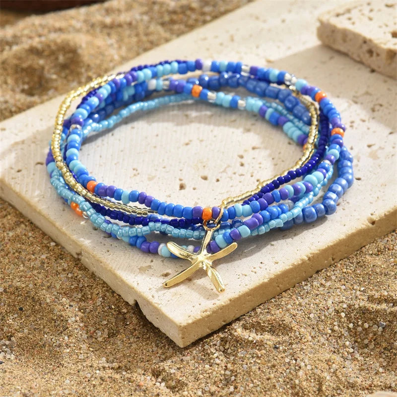 the BEADED STARFISH - Boho Stacking Multilayer Color Rice Beads Starfish Bracelet for Women, Fashion Beaded Rope Chain Summer Beach Wrist Jewelry Gifts