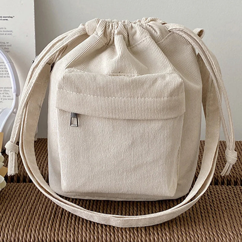 the CORDUROY CROSS-BODY - Solid Satchel Purse, Adjustable Strap Casual Shoulder Bag, Drawstring Corduroy Crossbody Bag. Versatile Slouchy Travel Bag