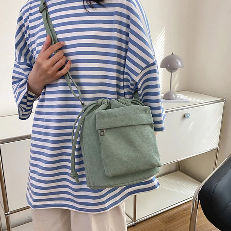 the CORDUROY CROSS-BODY - Solid Satchel Purse, Adjustable Strap Casual Shoulder Bag, Drawstring Corduroy Crossbody Bag. Versatile Slouchy Travel Bag