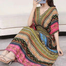 the TIBET BOHO - Casual Elegant Retro Bohemian Style V-Neck Elastic Waist Large Swing Printed Summer Long Skirt Dress for Women