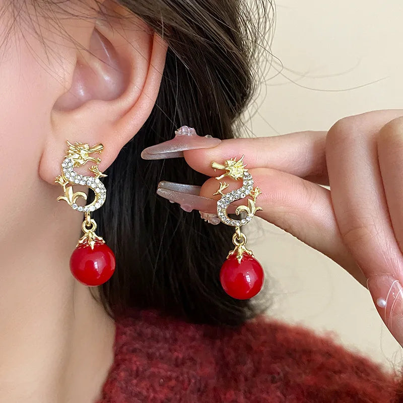 the GOOD FORTUNE - Chinese Style Red Little Lion Bell Pendant Earrings for Women, The Year of The Dragon Festive Jewelry Gifts