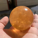 the CITRINE CALCITE - 1PC Natural Citrine Calcite Quartz Crystal Sphere Ball, Healing Gemstone Home Decor + Wood Bracket