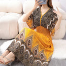 the TIBET BOHO - Casual Elegant Retro Bohemian Style V-Neck Elastic Waist Large Swing Printed Summer Long Skirt Dress for Women