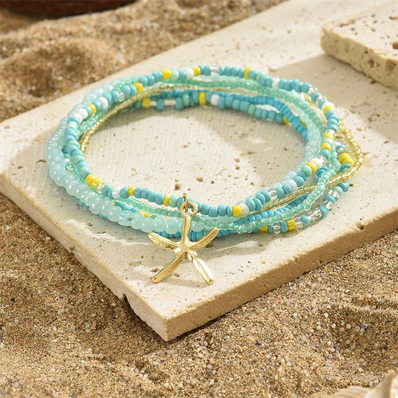 the BEADED STARFISH - Boho Stacking Multilayer Color Rice Beads Starfish Bracelet for Women, Fashion Beaded Rope Chain Summer Beach Wrist Jewelry Gifts