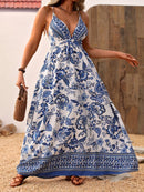 the BLUE PORCELIAN BOHO - Women's Floral Print Maxi Dress | Deep V-Neck with Crisscross Straps | Polyester, Non-Stretch Woven Fabric | Elegant Blue and White Flowy Design for Spring/Summer | Machine Washable | Perfect for Vacation & Casual Outings