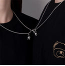 the MOON MAN LOVERS - Unique Astronaut Love Heart Magnetic Necklaces
