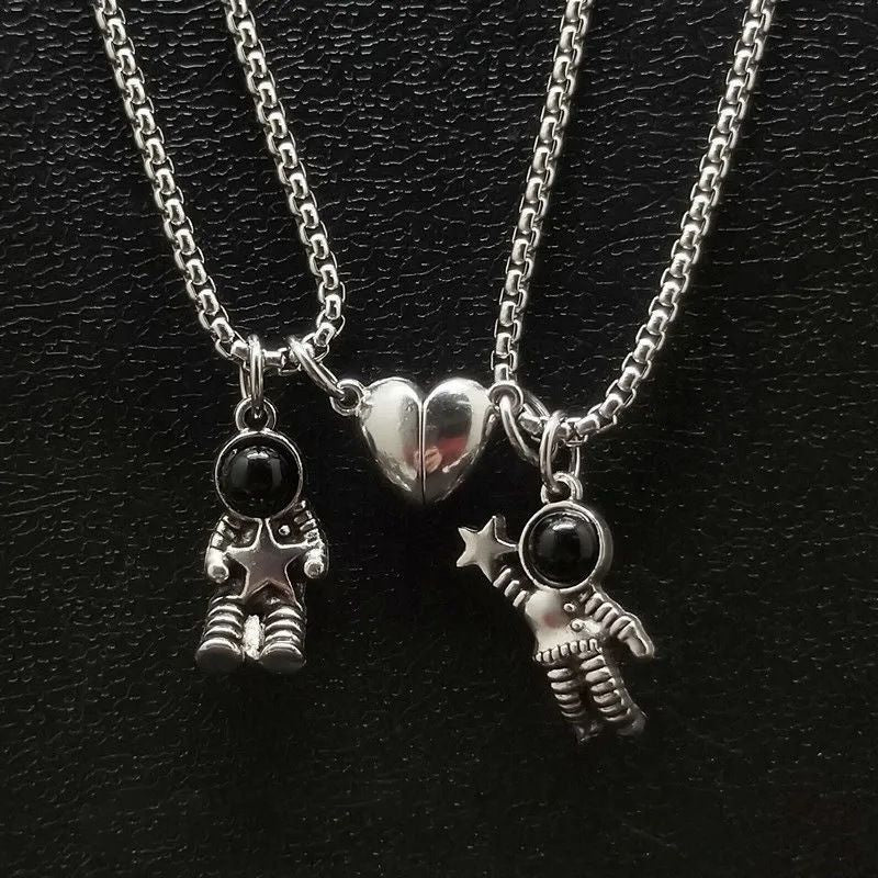 the MOON MAN LOVERS - Unique Astronaut Love Heart Magnetic Necklaces