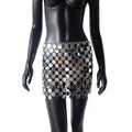 the DISCO - Color Block Disco Metal Chain Hollow Out Mini Skirts