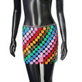 the DISCO - Color Block Disco Metal Chain Hollow Out Mini Skirts